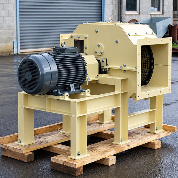 Industrial hammer mills for grinding and reducing suitable waste materials for easier handling